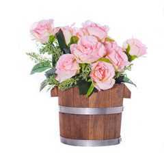 flowers in wooden bucket