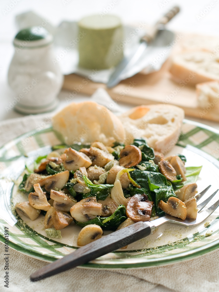 Sticker Spinach and mushroom salad with cheese, selective focus