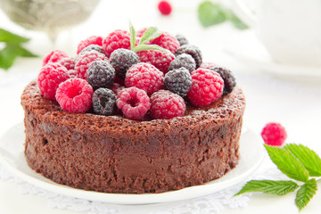Chocolate mousse cake with raspberries.