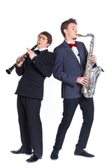 Boys with saxophone and clarinet