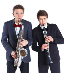Boys with saxophone and clarinet