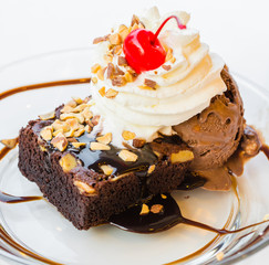 Chocolate brownie icecream and cherry