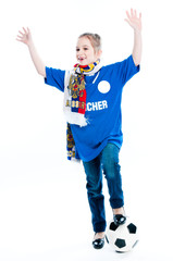 small and beautiful girl with a soccer ball