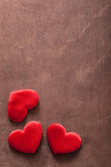 red hearts over wooden background for Valentines day
