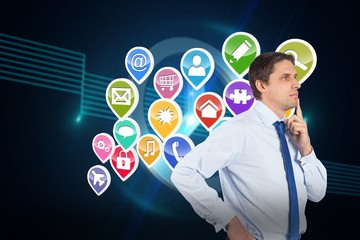 Composite image of thinking businessman touching his chin