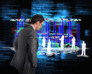 Composite image of serious businessman with hands on hips