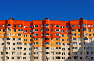 Low angle view of brightly colored apartment building