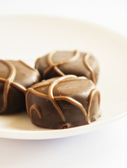 Tasty chocolate bonbon isolated on a white background
