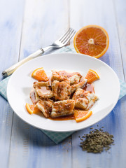 salted cod with orange juice and fennel seeds, selective focus