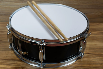 Fototapeta na wymiar Drum and drumsticks