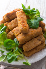 home-baked fish sticks with salad