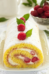 Roulade with raspberries and cream.