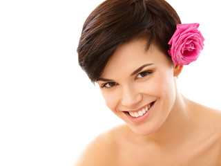 Naklejka premium Spa Woman. Portrait of a Smiling Young Woman With Flower
