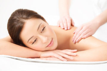Obraz na płótnie Canvas Massage. Close-up of a Beautiful Woman Getting Spa Treatment