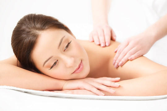 Massage. Close-up of a Beautiful Woman Getting Spa Treatment