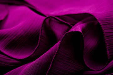 purple, violet tender colored textile, elegance rippled material