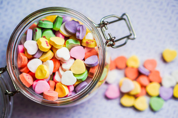Closeup of heart candies with message