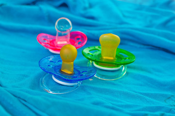 Row of babies dummies pacifier