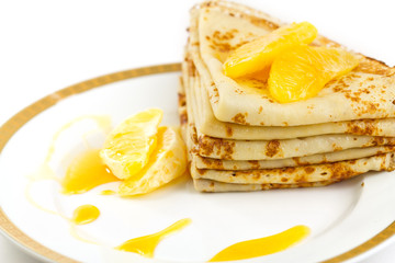 Pancakes and orange.