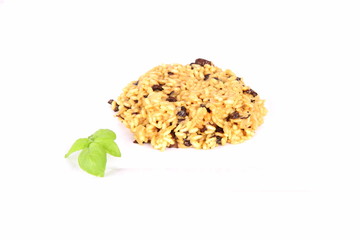 Risotto with mushrooms on a plate decorated with basil