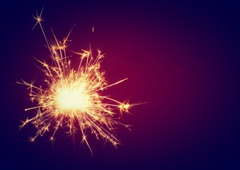 Fototapeta premium Christmas and newyear party sparkler on black