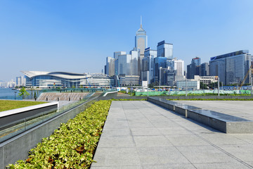Fototapeta premium Hong Kong Victoria Harbor morning with urban skyscrapers over se