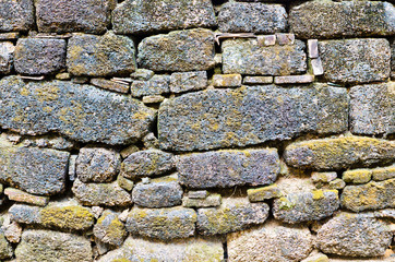 Very old big stone wall closeup