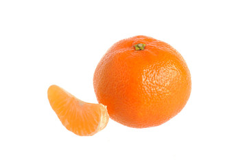 One mandarin and a slice isolated on white