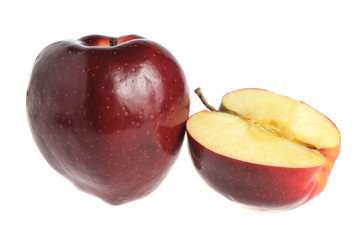 A half and a whole red apple on white isolated