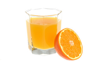 A half of orange with a glass filled with citrus juice isolated