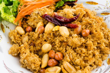 Crispy catfish salad on plate isolated white background