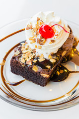 Chocolate brownie icecream and cherry