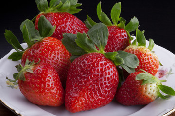 Strawberries on white plate