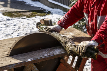 Man working with circular saw blade