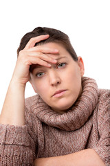 Frau st&uuml;tzt Stirn an Hand ab