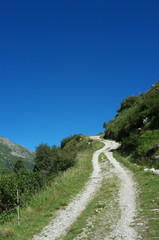 Uphill unsealed road in the mountains