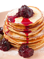 Delicious pancakes with currant jam