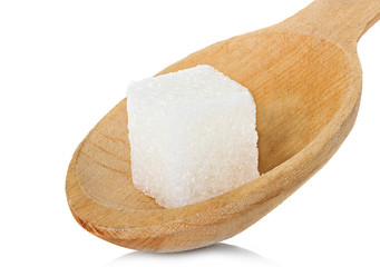 sugar cube in spoon