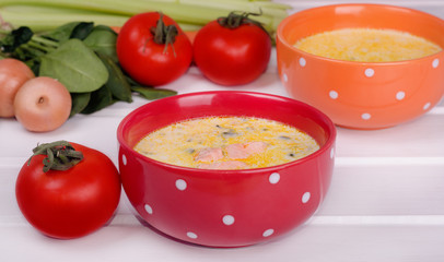Cheese soup with trout and vegetables