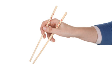 Female hand holding chopsticks with chinese inscription