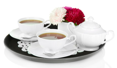 Cups of tea on tray isolated on white