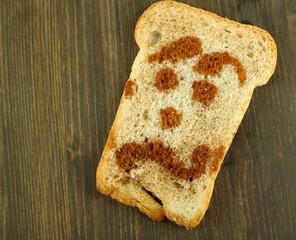 Funny toasts, on wooden background