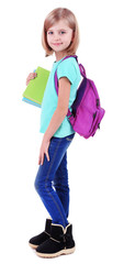 Beautiful little girl with backpack holding books isolated