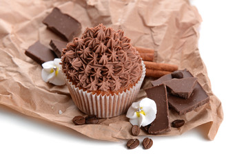 Tasty cupcake with butter cream, with decorations, isolated