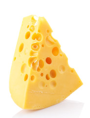 Piece of cheese on plate, isolated on white