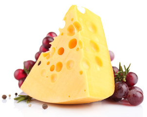 Piece of cheese with grape and rosemary, isolated on white