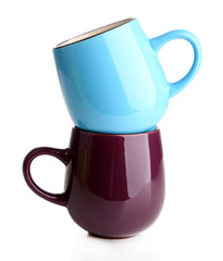 Colorful cups isolated on white