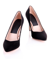 Beautiful black female shoes, isolated on white