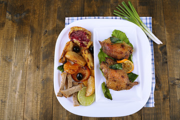 Homemade fried chicken drumsticks with vegetables