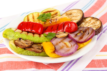 Delicious grilled vegetables on plate on table close-up